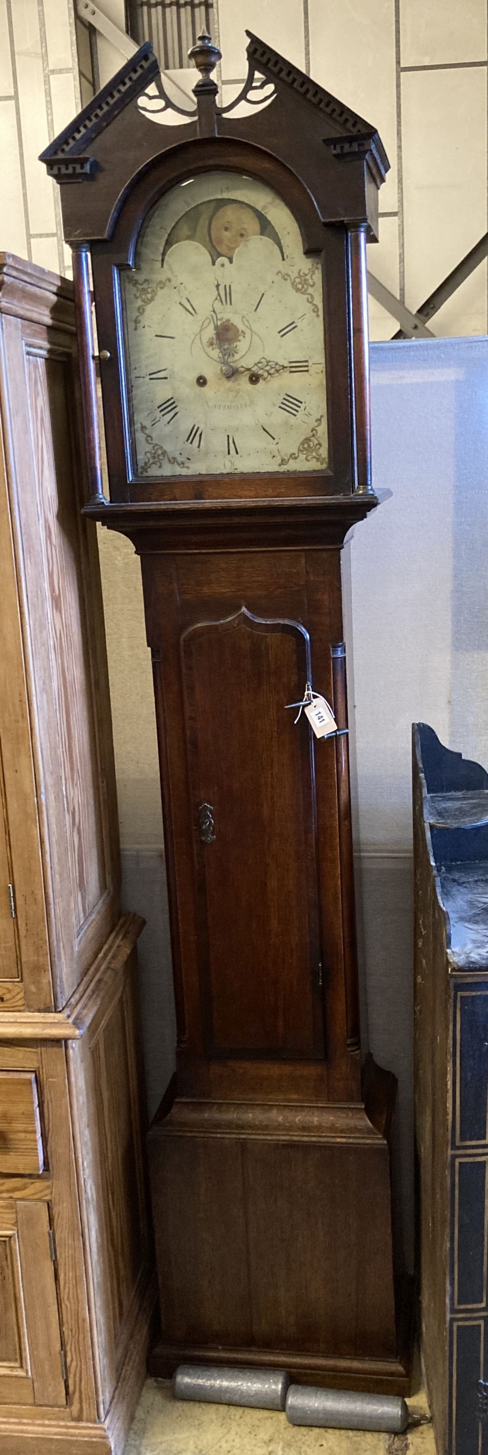 A 19th century oak eight-day longcase clock with painted dial, height 220cm